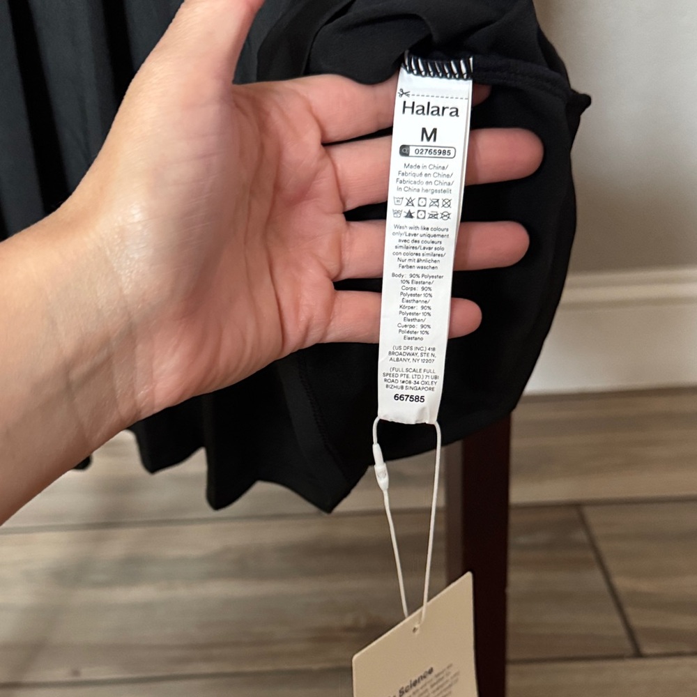Black Halará Pleated Tennis Dress with Green Waistband - Picture 2 of 5